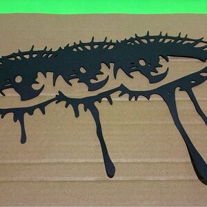 Sad Eyes Black Dripping Metal Wall Art Decor